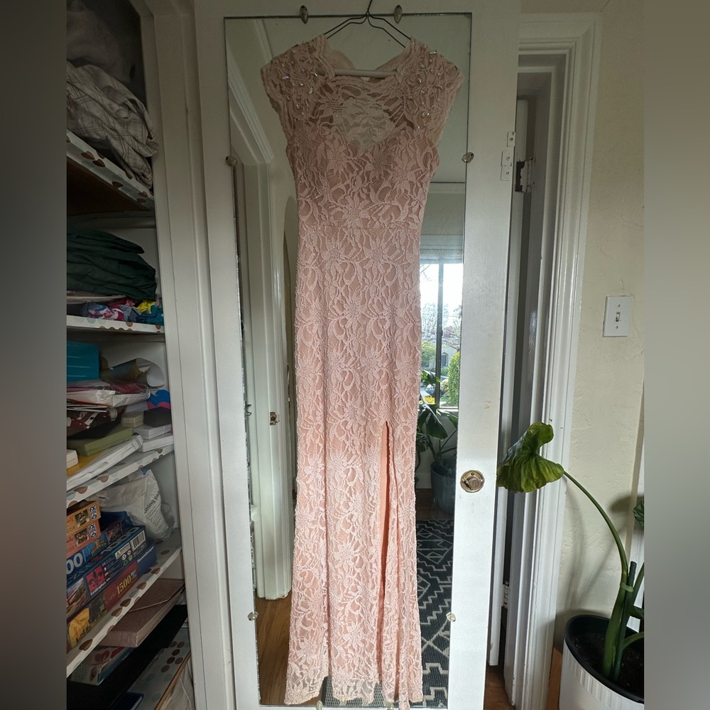 A beautiful coral bridesmaid dress that has only been worn twice
